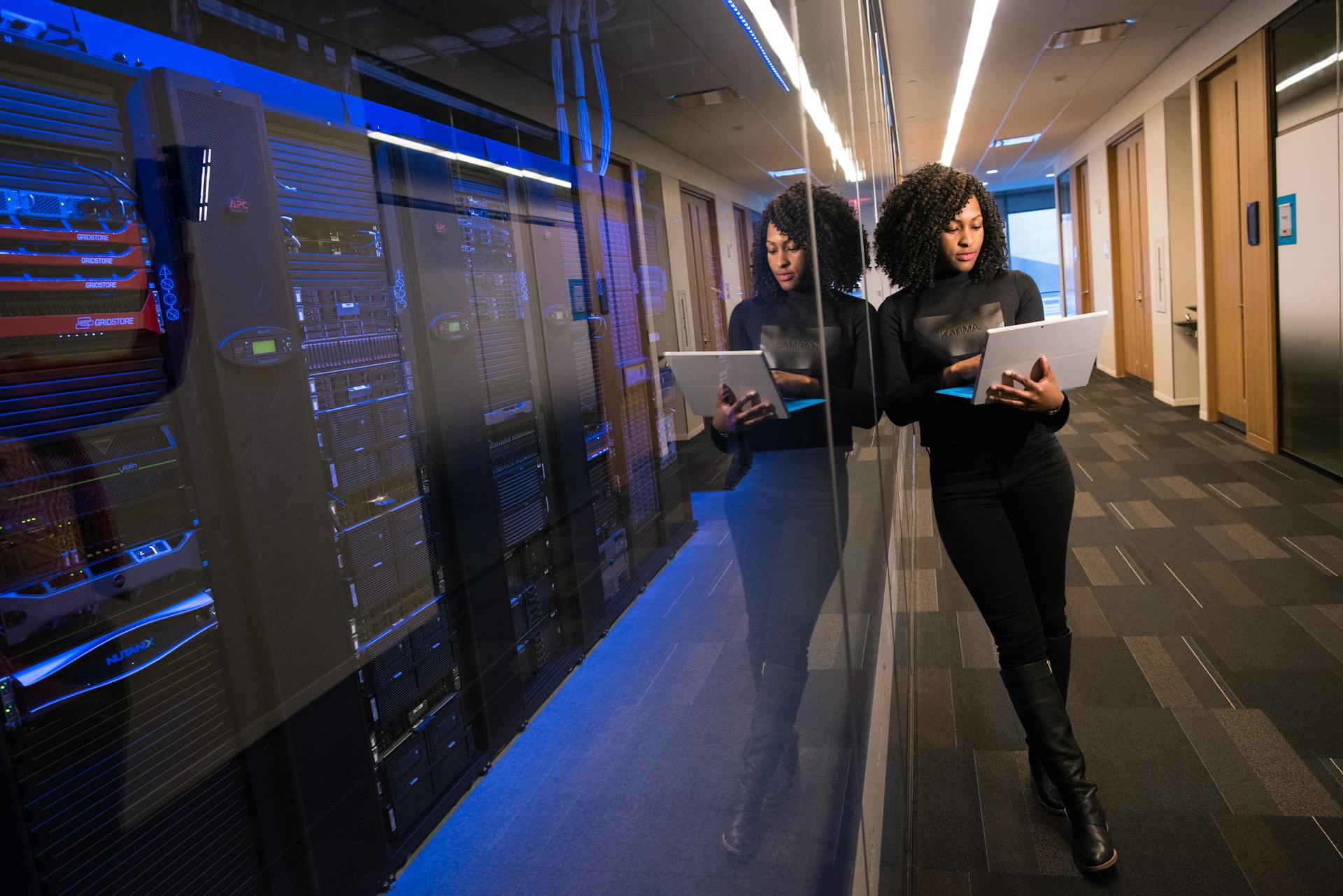 IT engineer reviewing server infrastructure